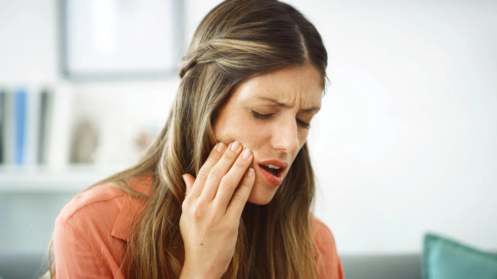 Patient receiving professional tooth pain treatment at Magnum Dental Clinic