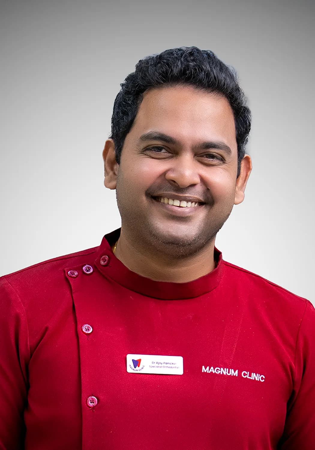 Dr. Ajay Sidharth Panicker, Invisalign-certified orthodontist at Magnum Clinic Dubai