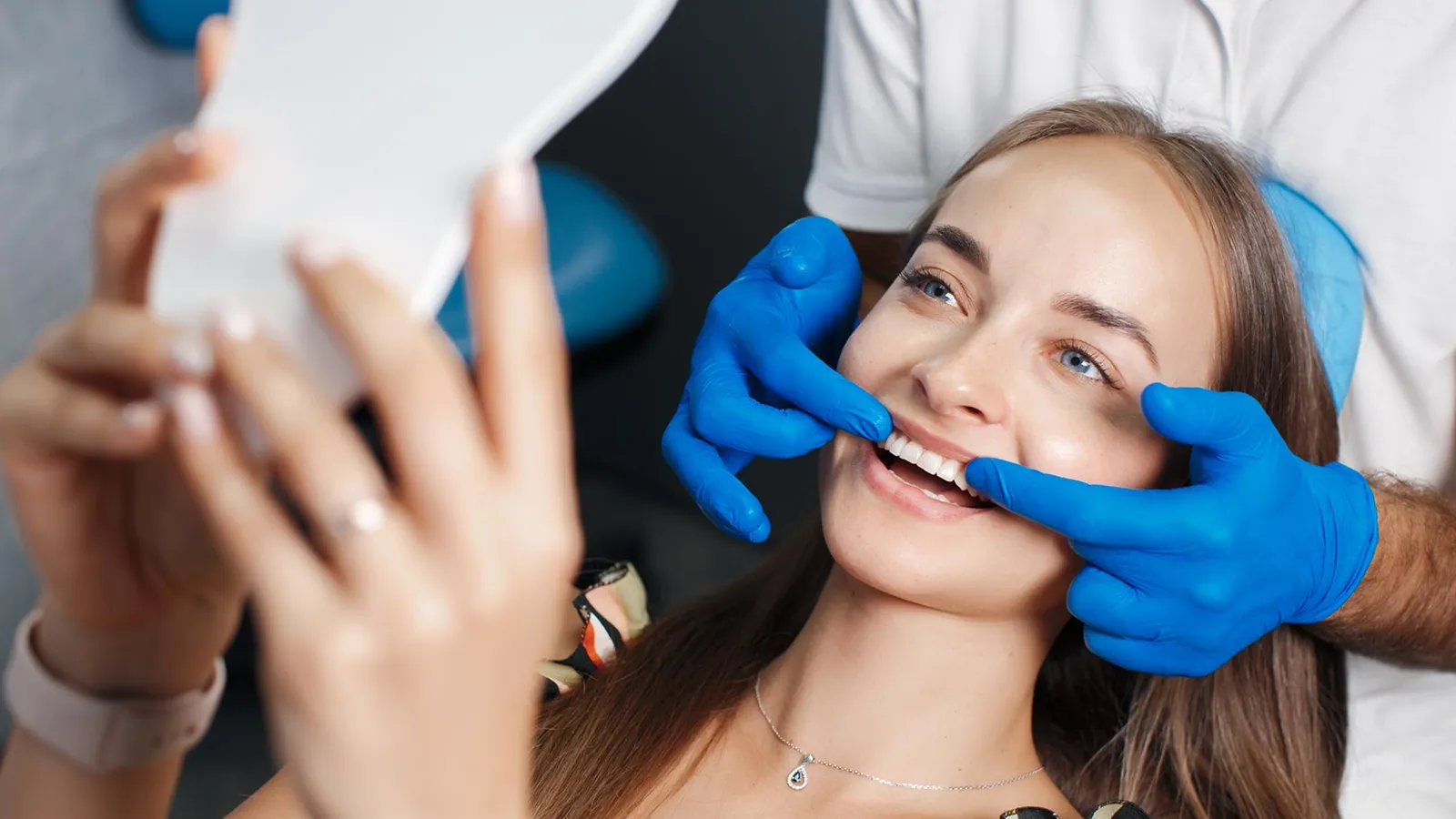 Patient in dental chair during teeth extraction consultation