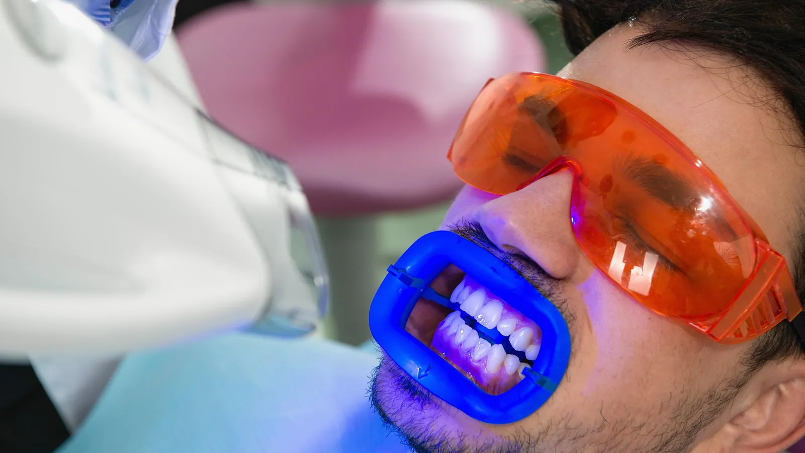 Patient in dental chair during teeth extraction consultation