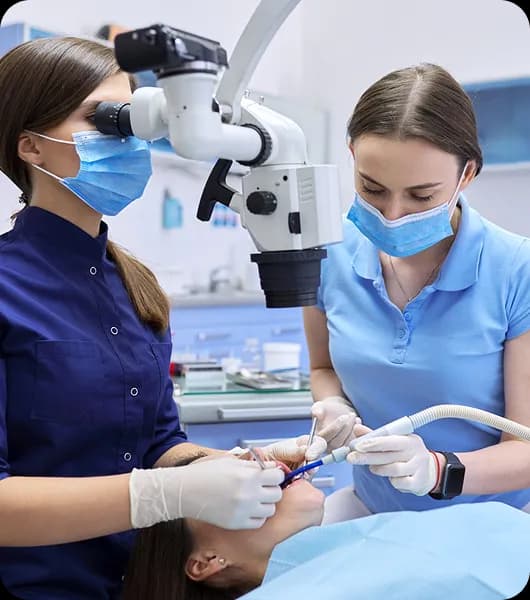 Dental professional and patient in clinic
